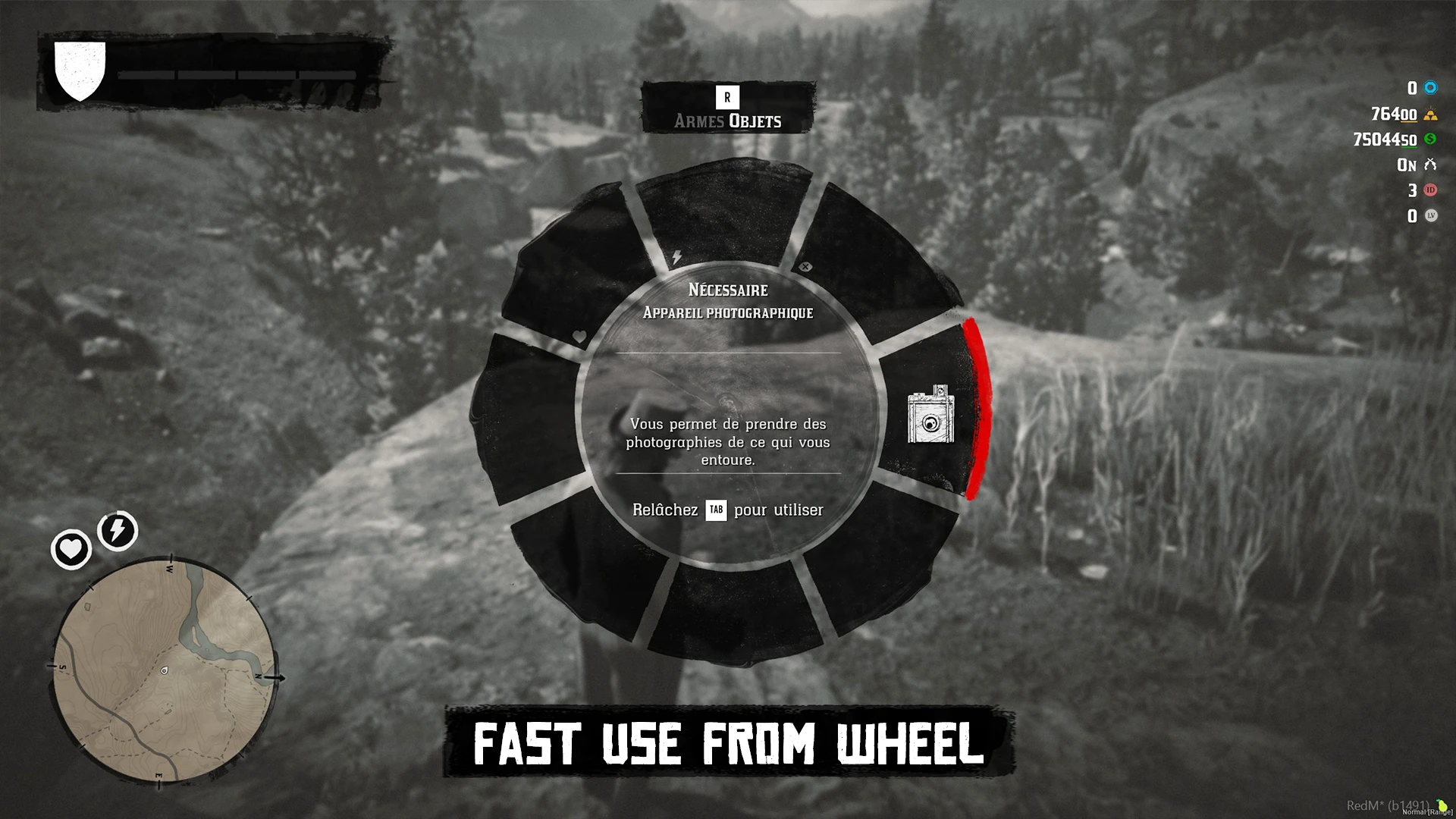 Use the camera kit from your weapon wheel.